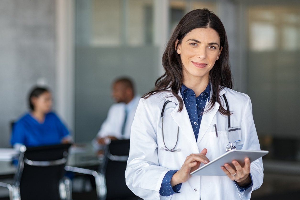 Doctor with ipad for survey